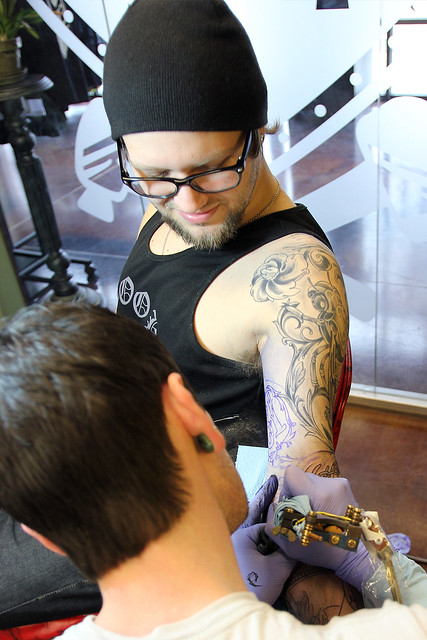 Getting tattooed by Joshua Bowers at Iron Heart Tattoo
