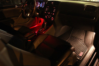 2011 VW GTI - Comparison of 6-LED red wafer footwell lights and the stock incandescent footwell bulbs.