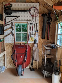 I used some scrap peg board from my basement shop to help organize a few lawn tools