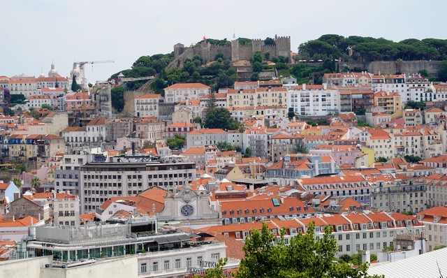 A castle and some hillside buildings in Lisbon