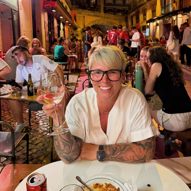 Enjoying the people watching and the vinho verde