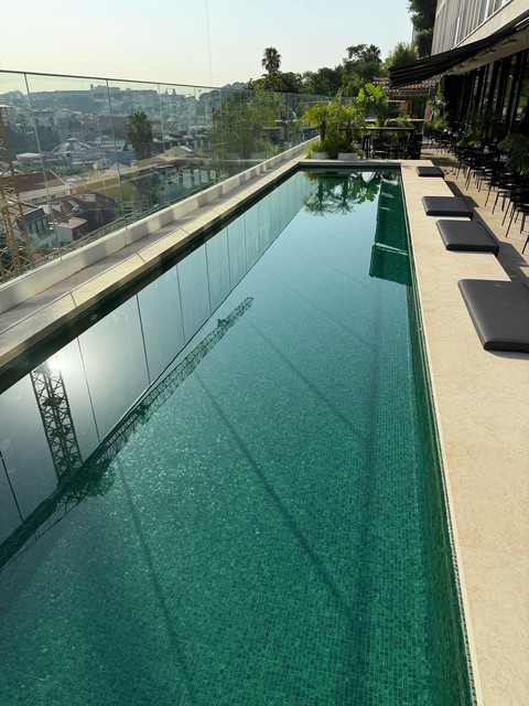 The reflecting pool is kinda green in Lisbon too.