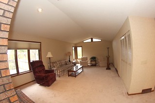 The living room, with fantastic bi-fold doors into a desk area.