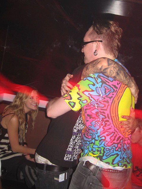 Pete Wentz is hugging Harper while Ashlee Simpson hangs in the background