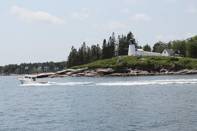 Rollin past a little lighthouse in the harbor of Boothbay