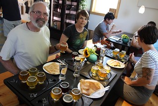 Samplin beers. Eatin crêpes.