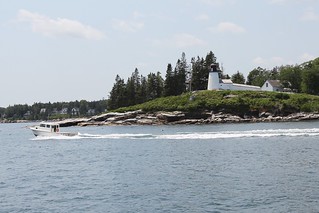 Rollin past a little lighthouse in the harbor of Boothbay
