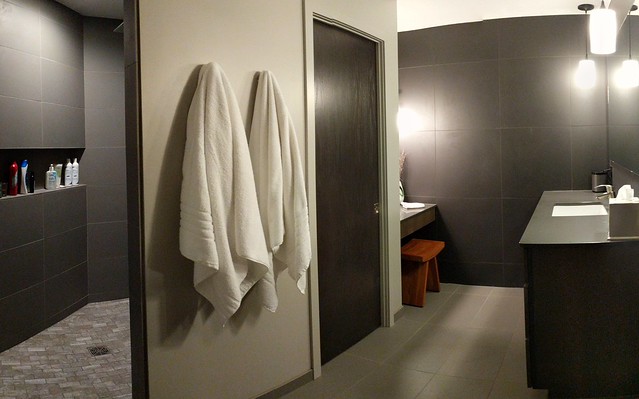 Walking into the master bathroom