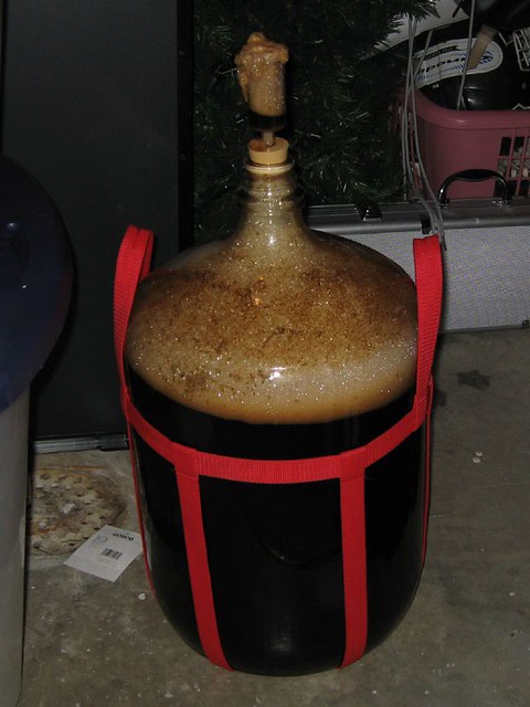 The carboy after 20 hours - the airlock is still intact, the bubbles are just coming out of the h...
