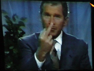 Politics - The Show is the Rainbow - George Bush flip off