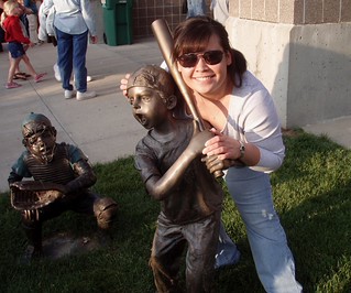 Tia is about as tall as that statue