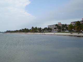 Looking down the beach from a rock pier.