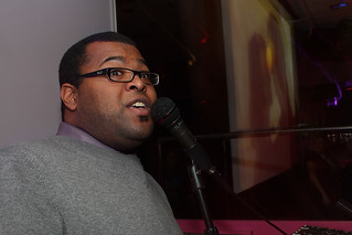 Mike Anderson - Ando singing with some lovers on the screen