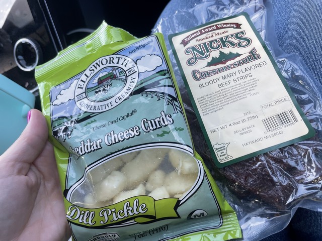 Kari found bloody mary flavored beef jerky and dill pickle curds for our road trip snackin. It wa...