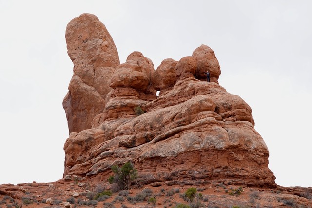 Notice the kid taking a selfie on this rock.