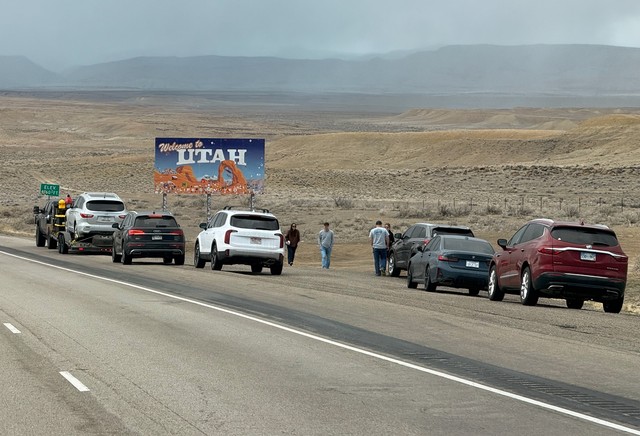 Some real overlanders pulling into Utah. Especially that trailered rig up front.