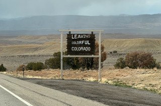 These signs feel like they're always in the least colorful parts of Colorado