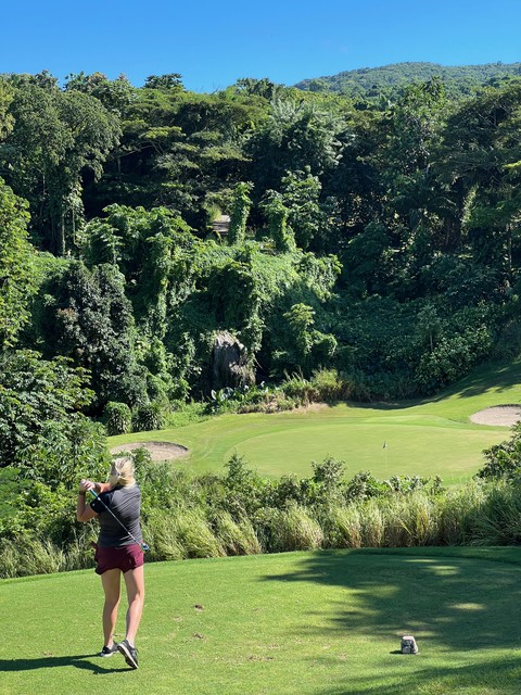 Kim hittin into another wild par 3