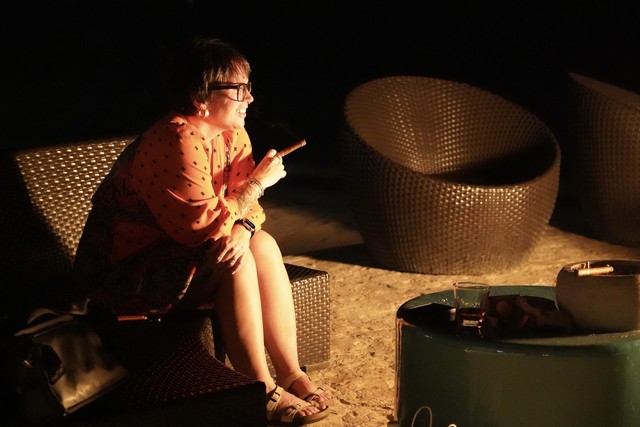 Cigars and hangs by a beach fire