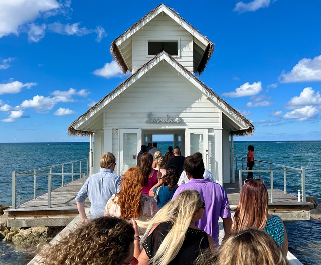 Wedding crew heads to the tiny chapel on the ocean