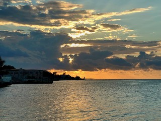 Sunset - Sun sets behind the clouds