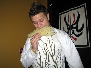 Eating some tempura rice plant... or noodles or something