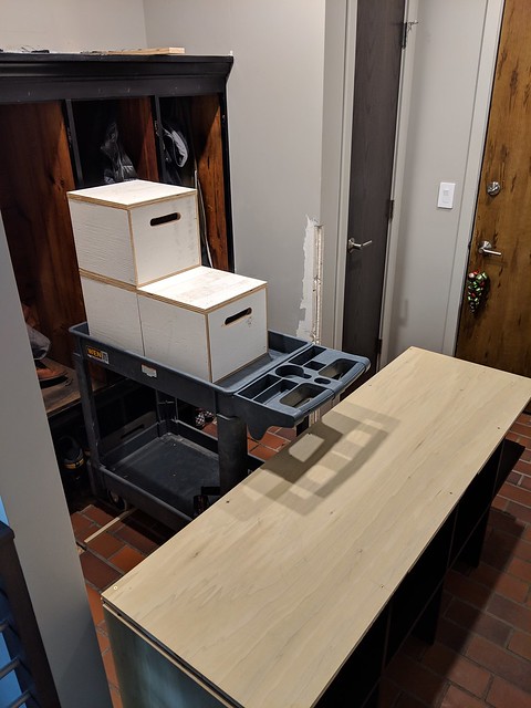 The top was super heavy and a very tight fit, so I made some little steps that Kari and I could use to lift, set, adjust grips and repeat.