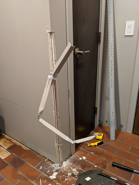 Removing the corner bead to slide the antique lockers in... the fit was that tight.