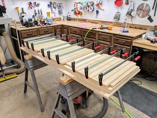 Facing the panels with 1" strips of poplar to match the 1" facing on the cabinet doors.