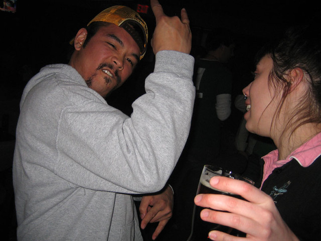 Nathan showing Jamie how to rock