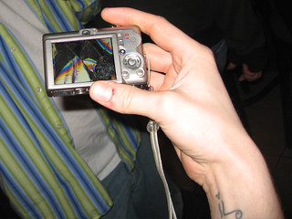 Camera - Rich's broken camera and Mitch's kitty cat tattoo