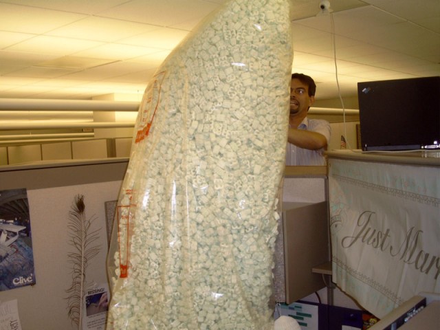 Neifert dumping a bag into my cube