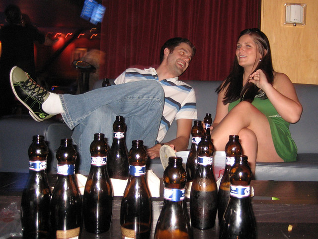 Just keep talking.  Pretend like you don't hear them.