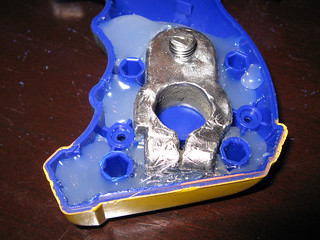 Nerf - The polished bettery terminal, hot glued into my handle.