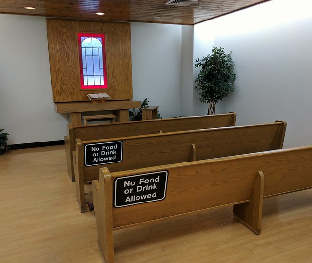 Debating whether or not to sleep in this airport chapel