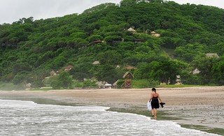 beach - Walking back to the main resort. The little buildings you see nestled on the hillside are what we...