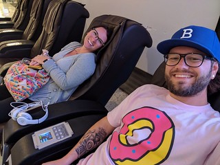 Getting massage chair massages after sleeping on those airport pews.