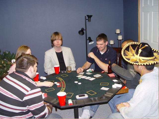 Kevi, Stacy, Cedric, Chuck, Nehru, and Nathan playing poker