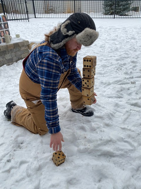 Pickin up giant dice is not easy