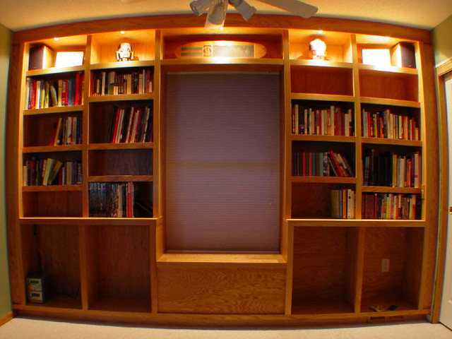 The (mostly) finished bookshelf (lights off)