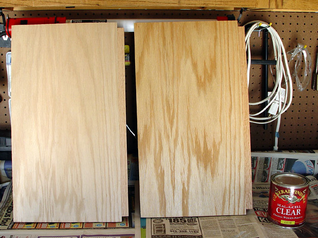 I finally started staining.  The one on the left is the original oak shelf.  The one on the right...
