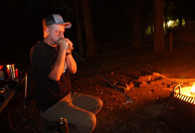 Playing my fire poker/stoker like a wind trumpet