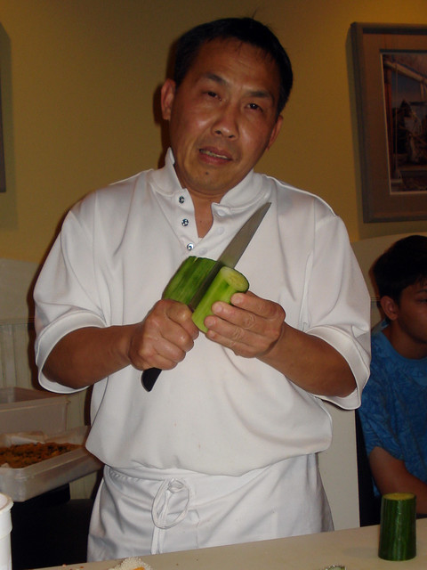 He spiraled that cucumber all the way to the seeds, then made a fancy roll out of it.