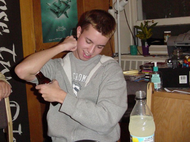 Opening a beer with an elbow pit