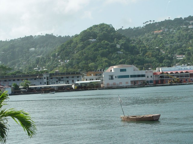 A tiny wooden boat in Port Castries