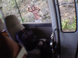 It's blurry, but this dude just caught a boa constrictor as we were driving by