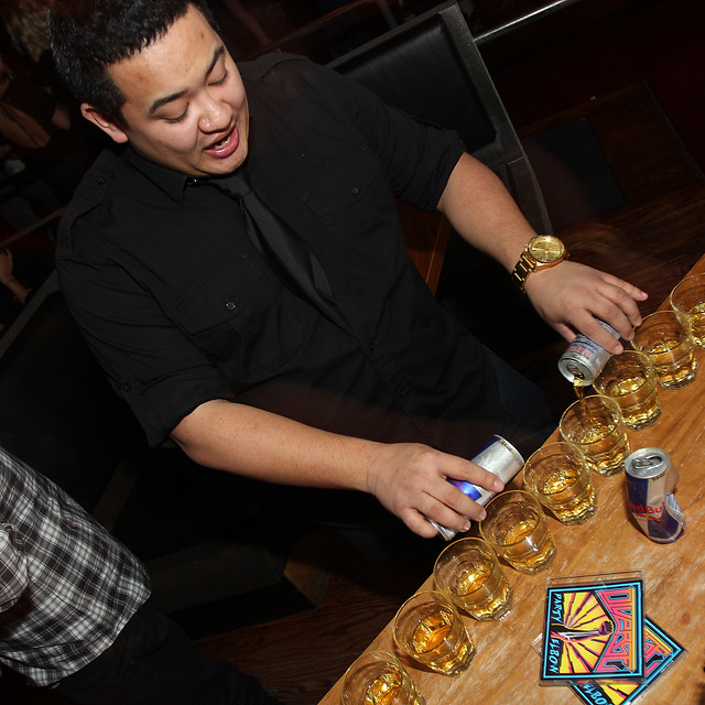 JP pouring shots in VIP