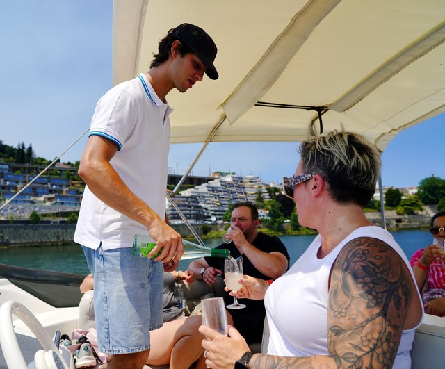 Getting a pour of some bubbly Vinho Verde