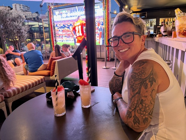 Grabbing a Grapefruit port cocktail on the Porto Cruz rooftop (and watching some more World Cup)