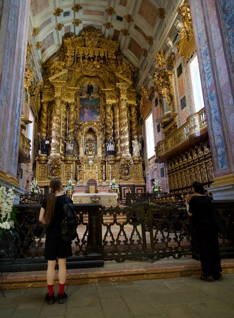 Some goth kids checking out the altar
